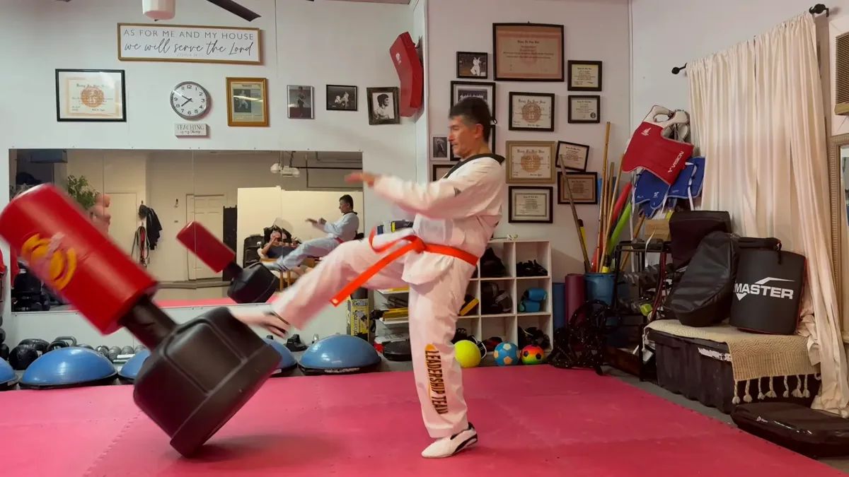 One-on-one Kung Fu practice at the Heath home studio for the Royse City class page